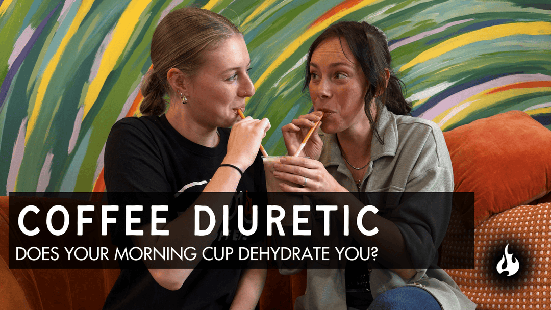 Two women sharing iced coffee on couch with text about coffee diuretic