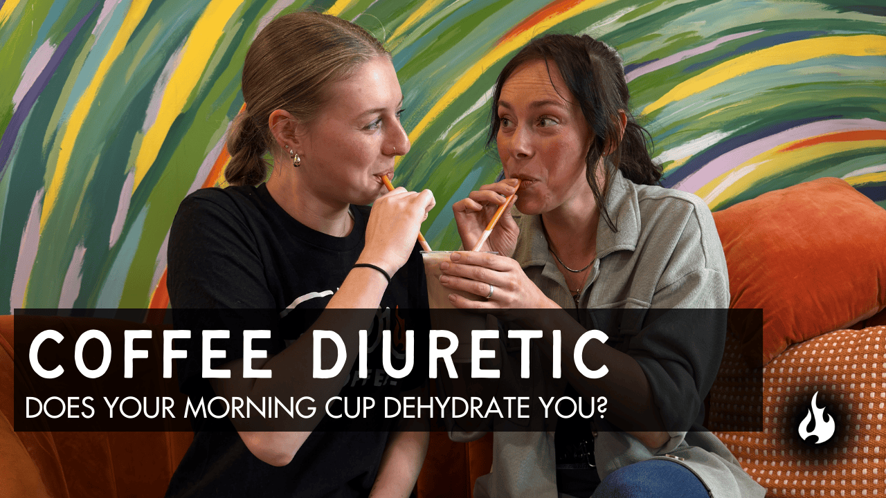 Two women sharing iced coffee on couch with text about coffee diuretic