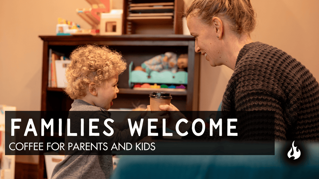 Parent and child at Ember Coffee Company in Big Lake, a family-friendly coffee shop in Minnesota.