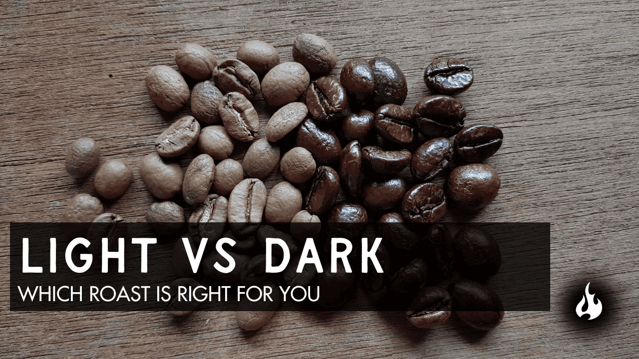 Light roast and dark roast coffee beans side by side on wooden surface
