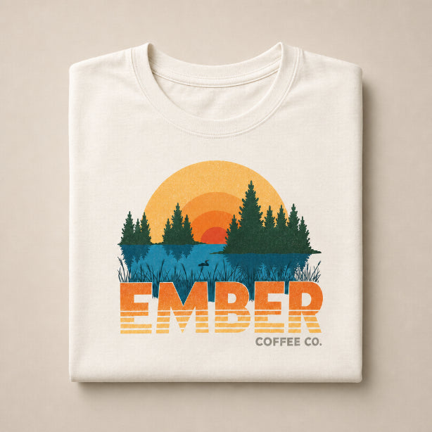 Ember Coffee Lakeside Tee (Unisex), sunset graphic tee folded flat