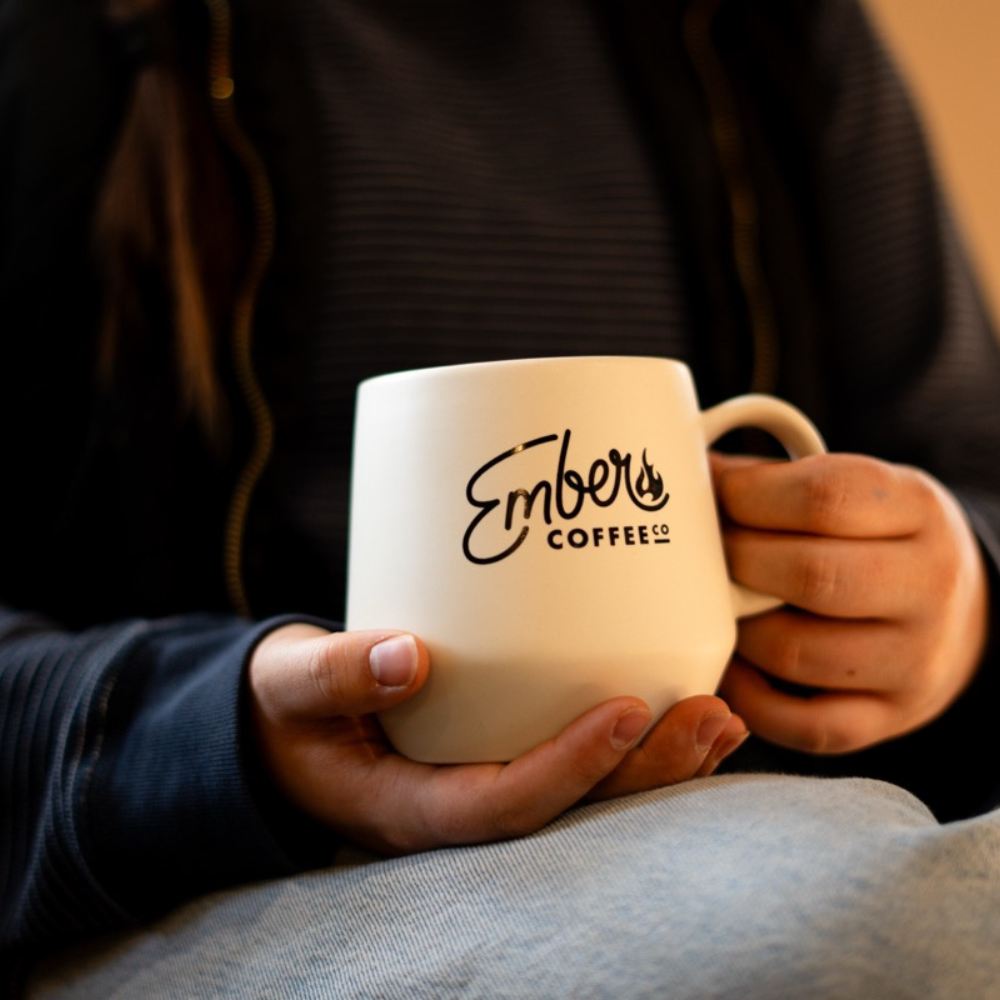 Ember Style "Verona" Mug, ivory stoneware mug, held in one hand