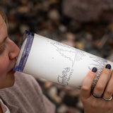 Drinking from the Ember Style Petal Tumbler outdoors