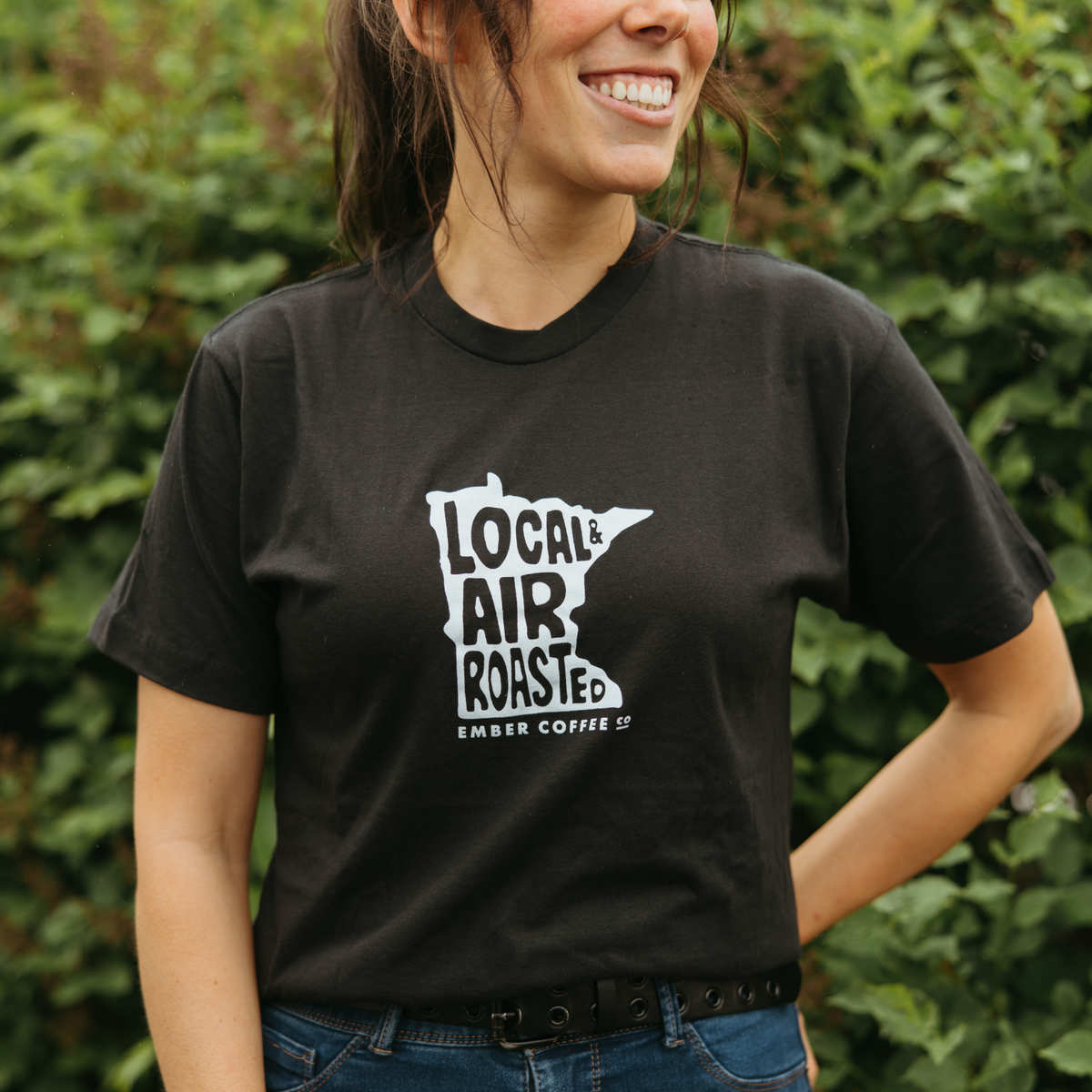 Local Air Roasted T-Shirt, black cotton tee with Local Air Roasted Minnesota graphic, on model