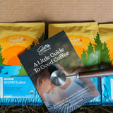 Ember Dark Roast Kit from above with 10,000 Lakes bag, guide and Ember Coffee Co. scoop