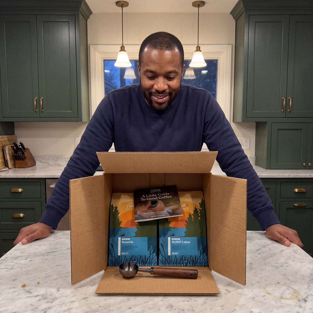 Ember Essentials Set, lifestyle, customer opening the box at a kitchen counter