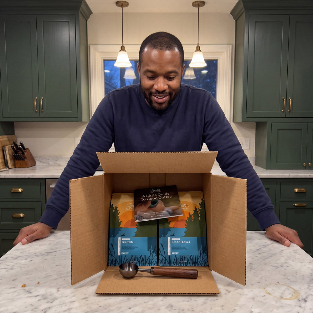 Ember Essentials Set, lifestyle, customer opening the box at a kitchen counter