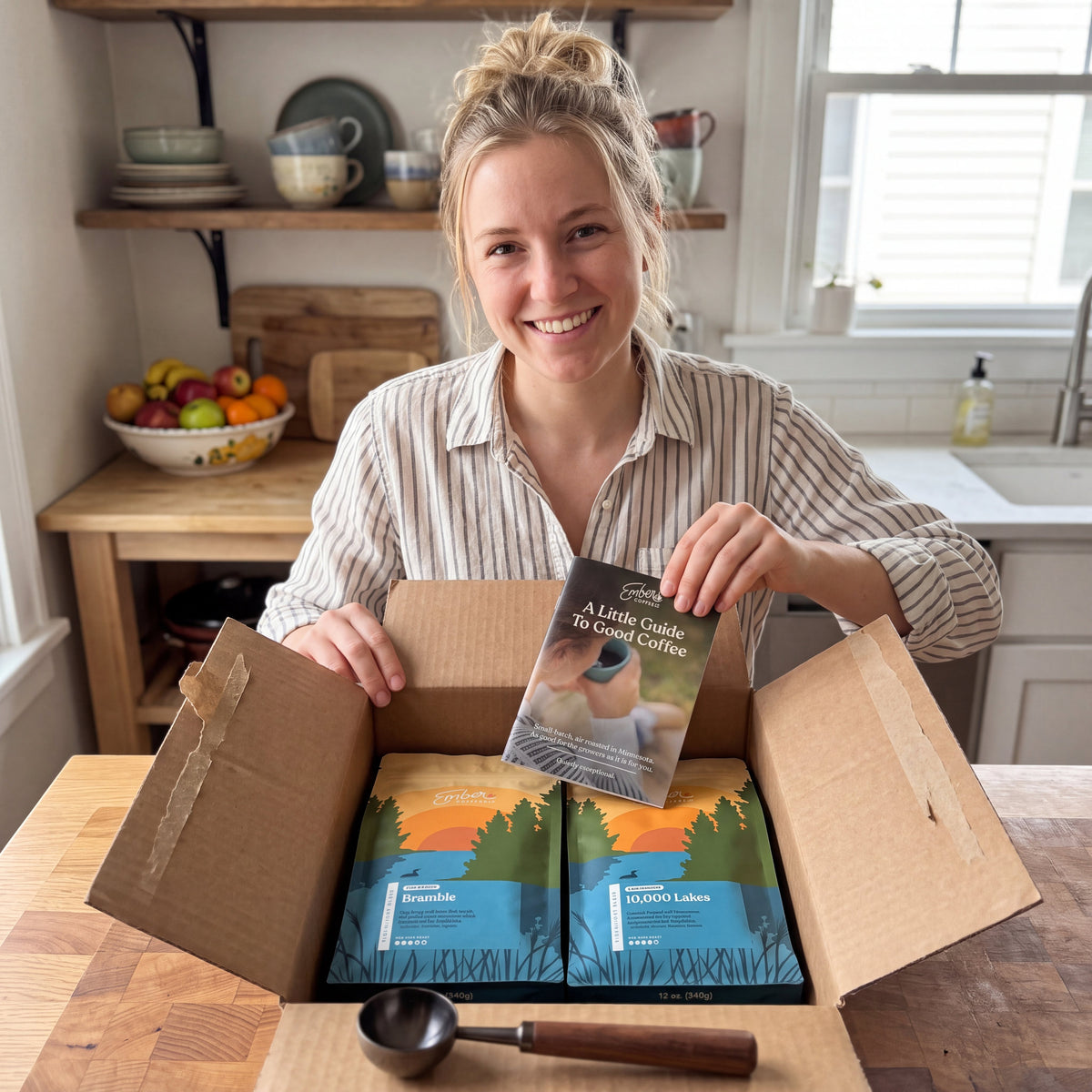 Ember Essentials Set, lifestyle, customer opening the box at a kitchen table