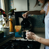 Pouring Ember Coffee from a kettle in a kitchen, lifestyle
