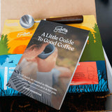 Ember Coffee Espresso Kit with guide booklet resting on Bramble and El Jefe bags