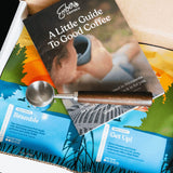 Ember Coffee Light Roast Kit open with Bramble and Get Up! bags, scoop and A Little Guide to Good Coffee