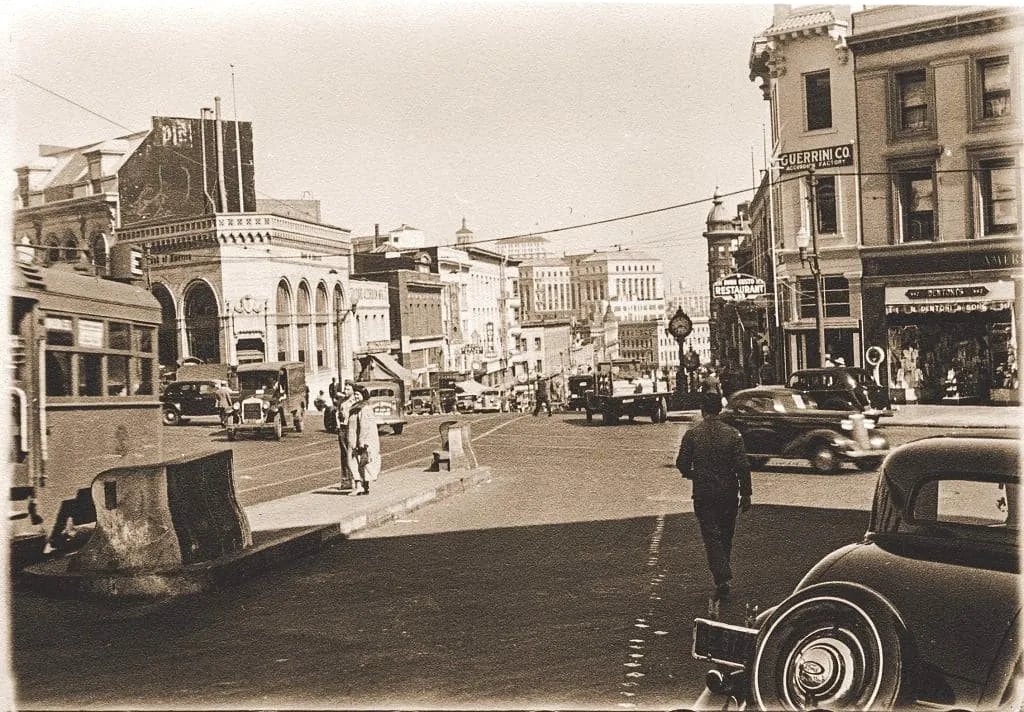 Historic city street lined with storefronts